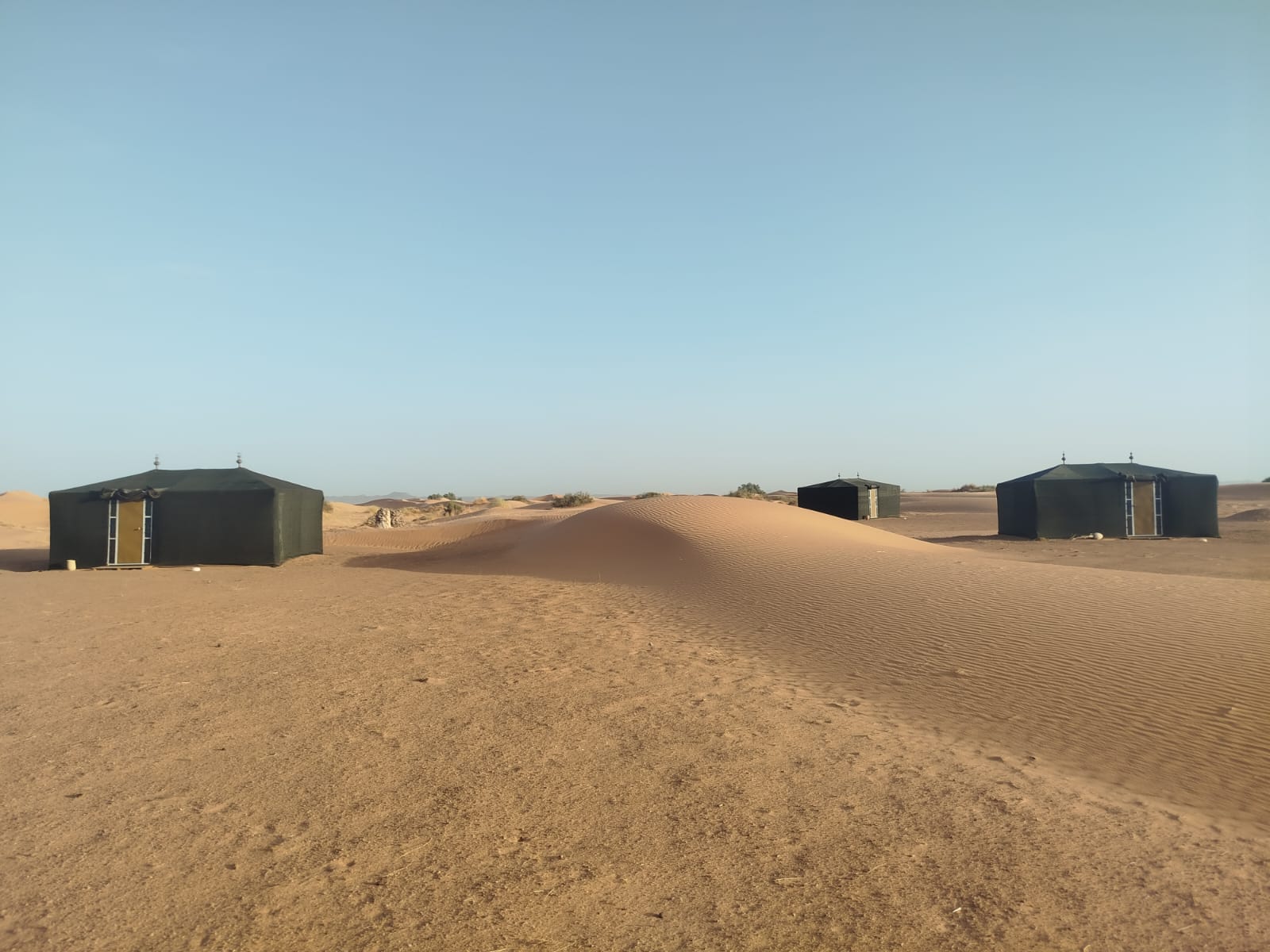 Luxury desert camp tent in Erg Chebbi dunes during 2 nights camel trekking in Merzouga